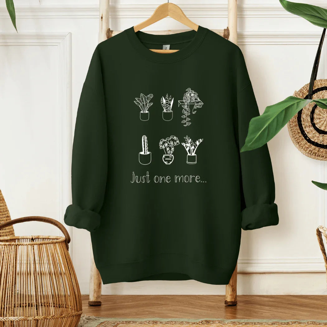 Forest green sweatshirt with white potted plant sketches and 'Just one more...' text, garden gift