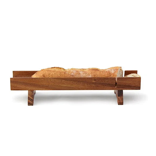 Rustic wooden bread tray holding a fresh baguette, styled for Qu!rk Boutique's artisan kitchenware.