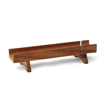 Handcrafted wooden decorative tray on short legs, styled for modern sustainable home décor