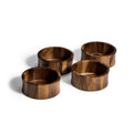 Set of four round wooden bowls on white background, eco-friendly serveware from Qu!rk Boutique