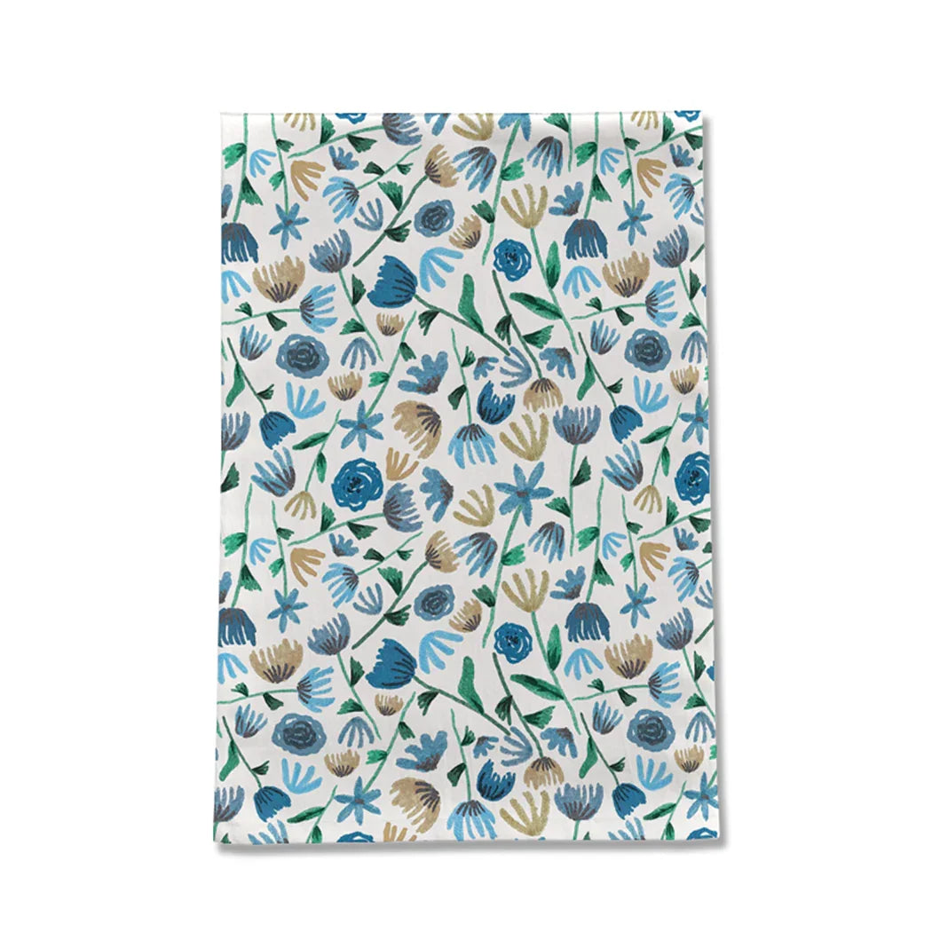 Patterned tea towel with blue, green, and beige hand-drawn floral design, Qu!rk boutique decor