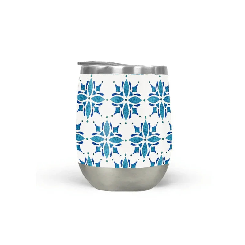 Stainless steel tumbler with blue floral tile pattern, Qu!rk artist-designed gift