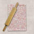 Wooden rolling pin on pink floral tea towel, artisan kitchen decor from Qu!rk Boutique