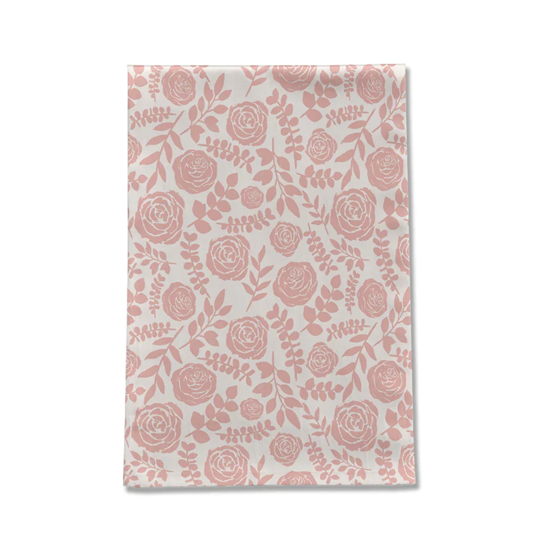 Pink floral tea towel with rose and leaf pattern, sustainable gift at Qu!rk Boutique