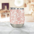 Pink floral stainless steel tumbler on marble counter, Qu!rk Boutique giftware