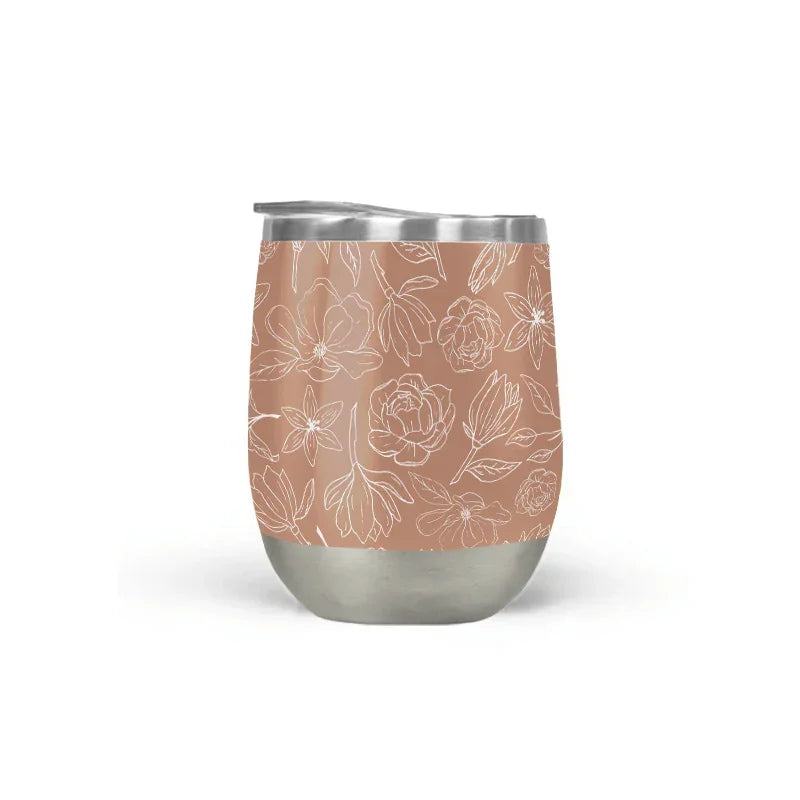Floral stainless steel tumbler with pink background, artist-designed at Qu!rk Boutique