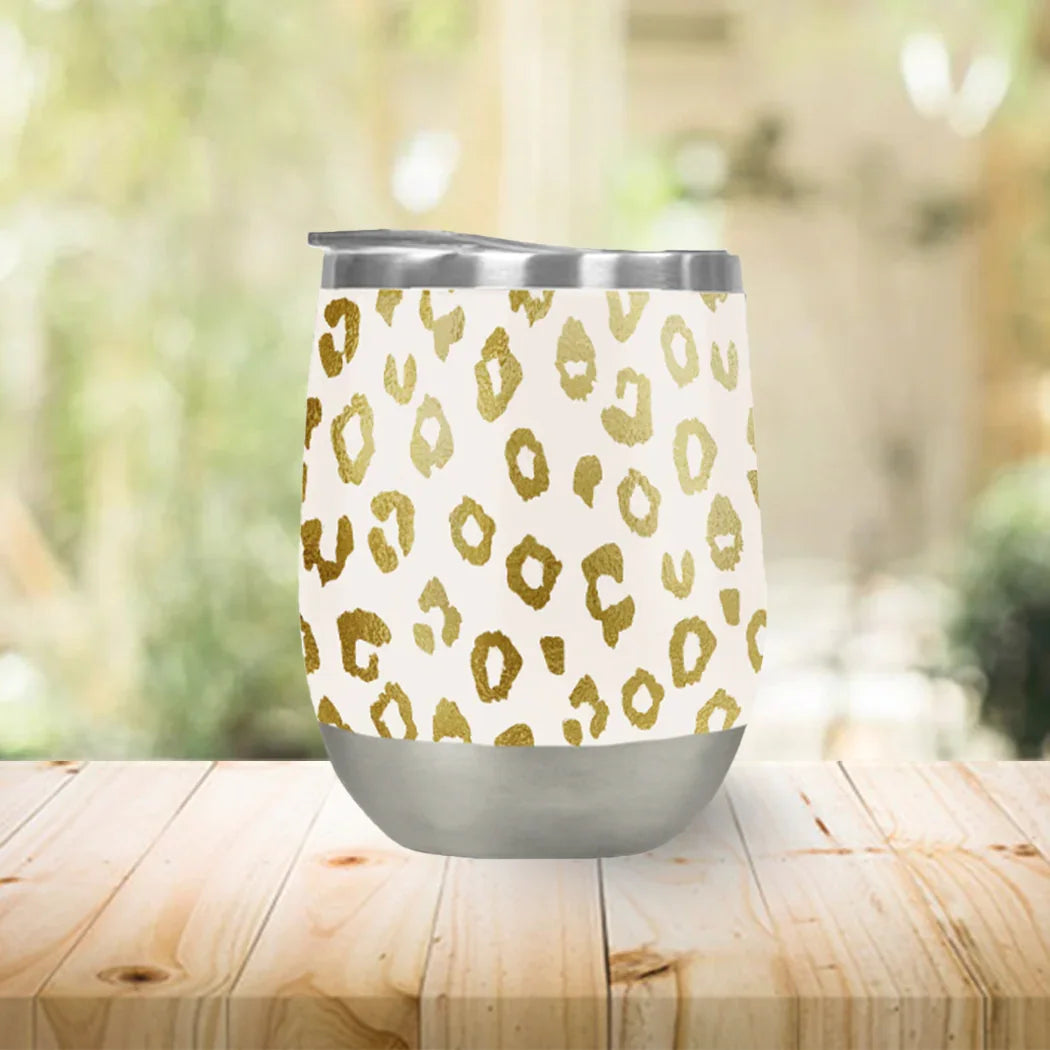 Gold leopard print stainless steel tumbler cup on wood table, Qu!rk Boutique gift idea