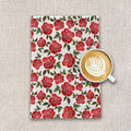 Red rose floral tea towel with a latte art coffee cup on textured fabric, Qu!rk Boutique gift