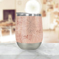 Insulated tumbler with pink botanical design on marble counter, Qu!rk Boutique gift shop product