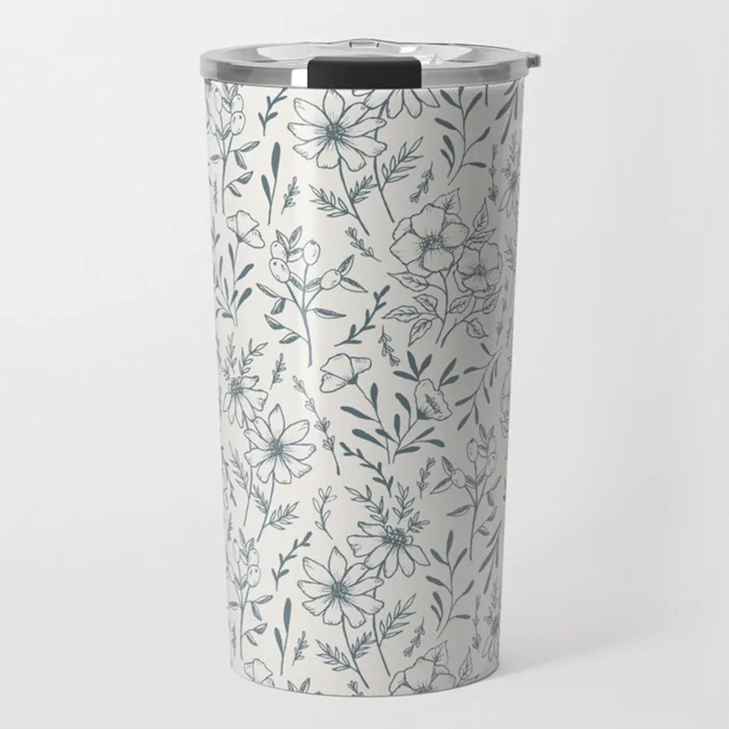 Stainless steel tumbler with black and white floral pattern and clear lid
