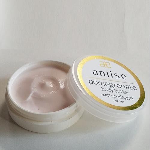 Aniise pomegranate moisturizing body butter cream with collagen in open jar on white background