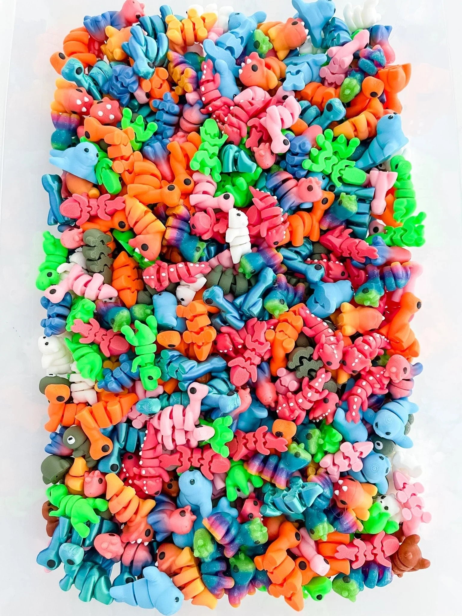 Colorful micro critter figurines in assorted animal shapes, Qu!rk Boutique mystery grab bag