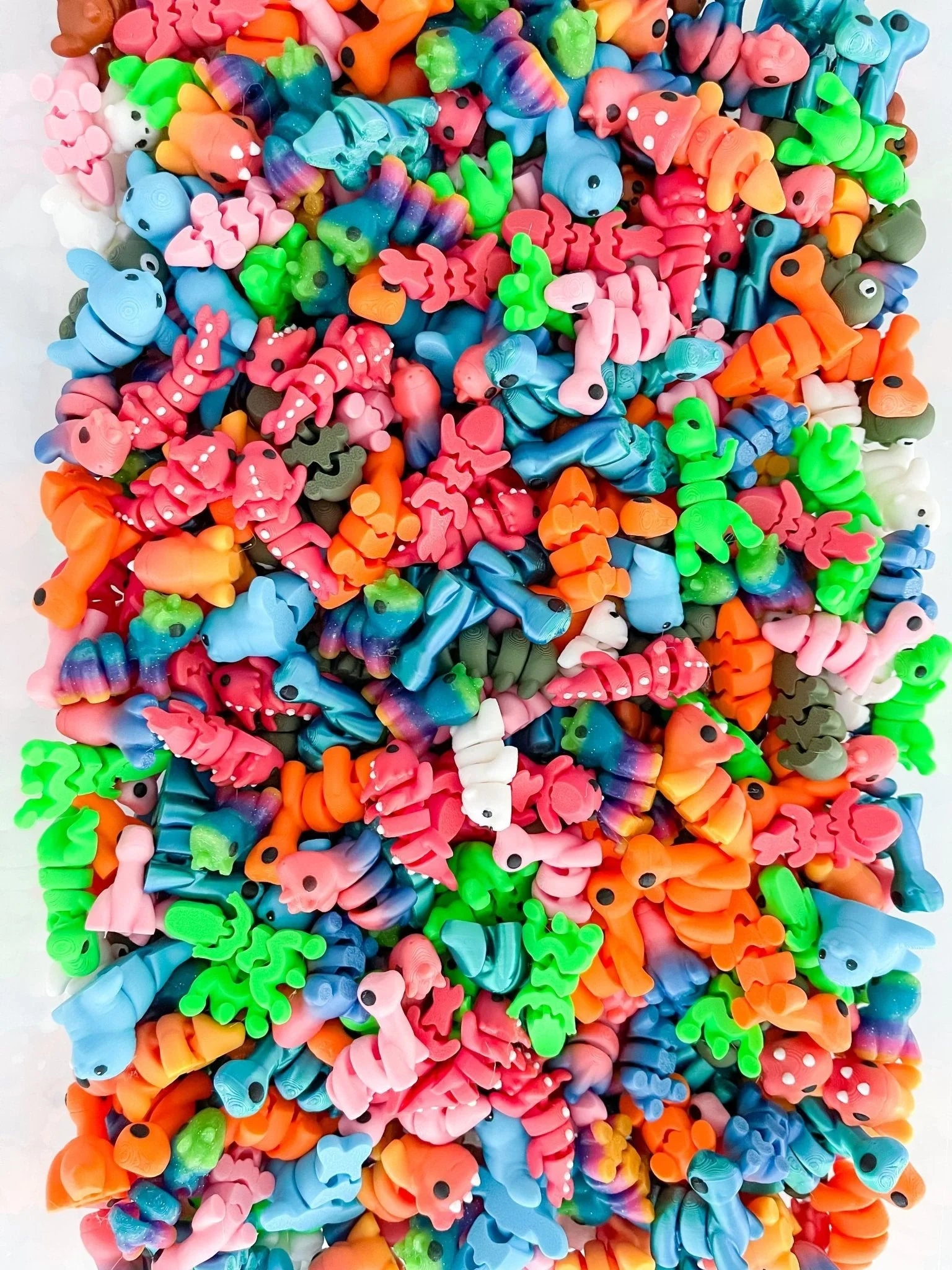 Colorful assorted micro critter figurines in bulk, perfect for Qu!rk Boutique gift bags