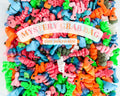 Colorful assortment of tiny animal critter toys labeled mystery grab bag, Qu!rk Boutique
