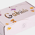 Personalized pink gift box with gold foil name Gabriela and floral accents from Lizush