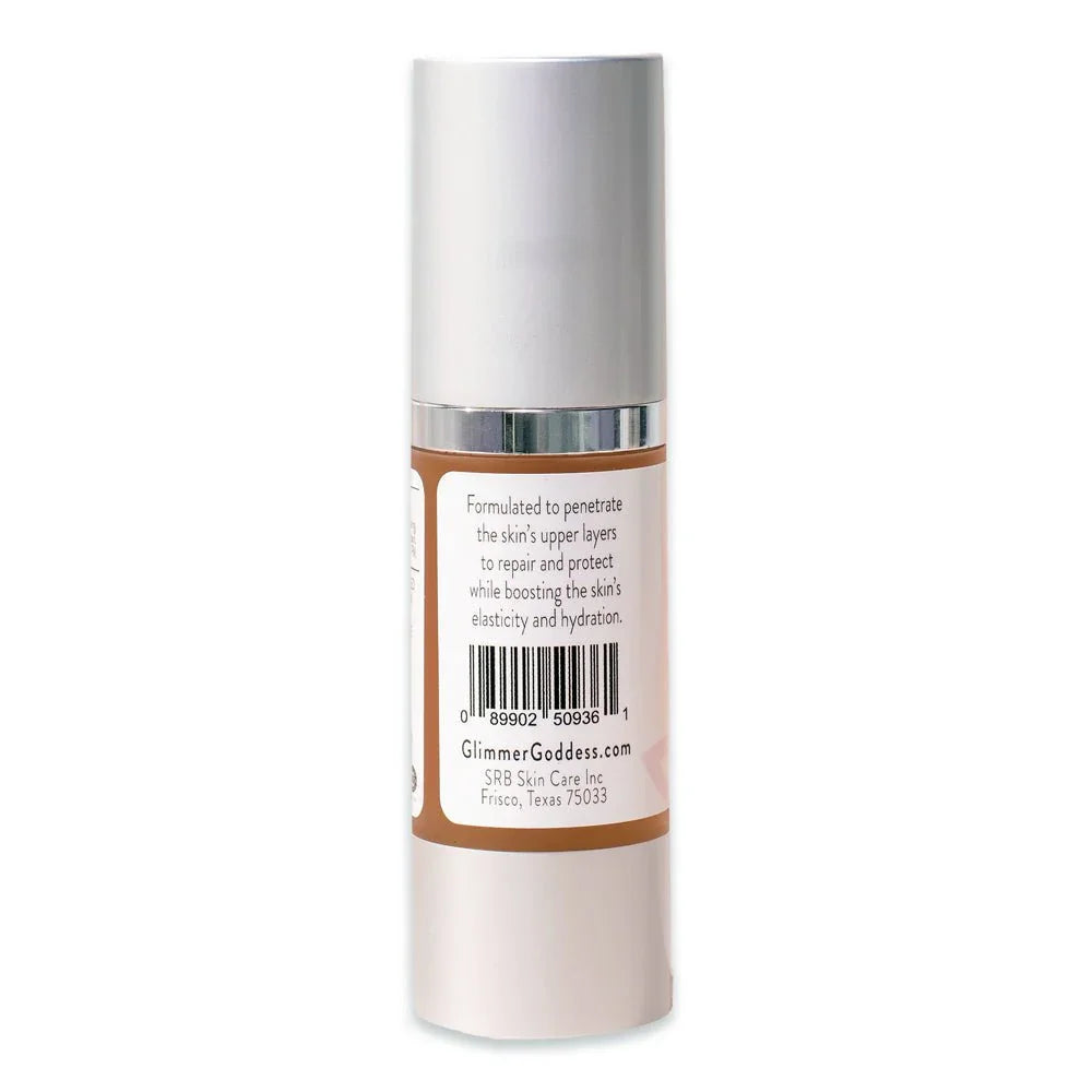 Back of skincare serum bottle with white label, barcode, and silver cap isolated on white