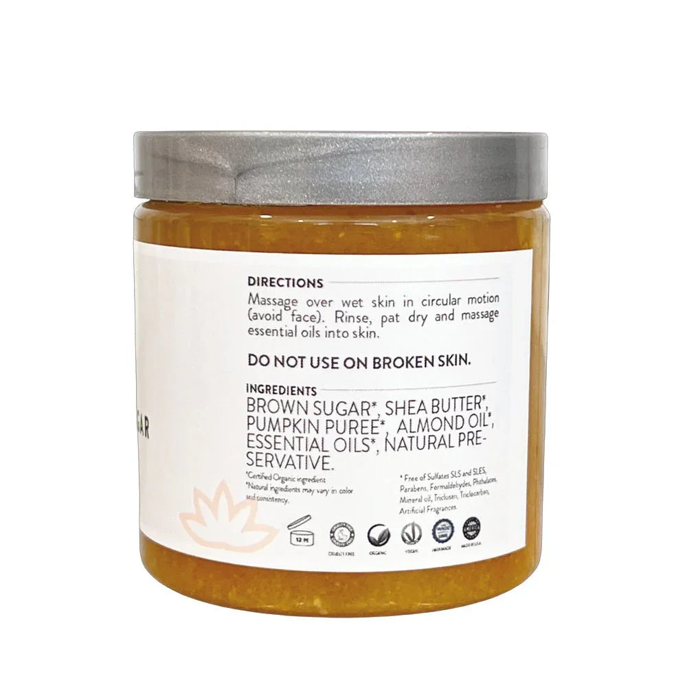 Jar of organic pumpkin shea sugar body scrub showing ingredient list and usage directions