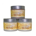 Three jars of Glimmer Goddess Organic Illuminating Whipped Body Butter with gold and silver labels