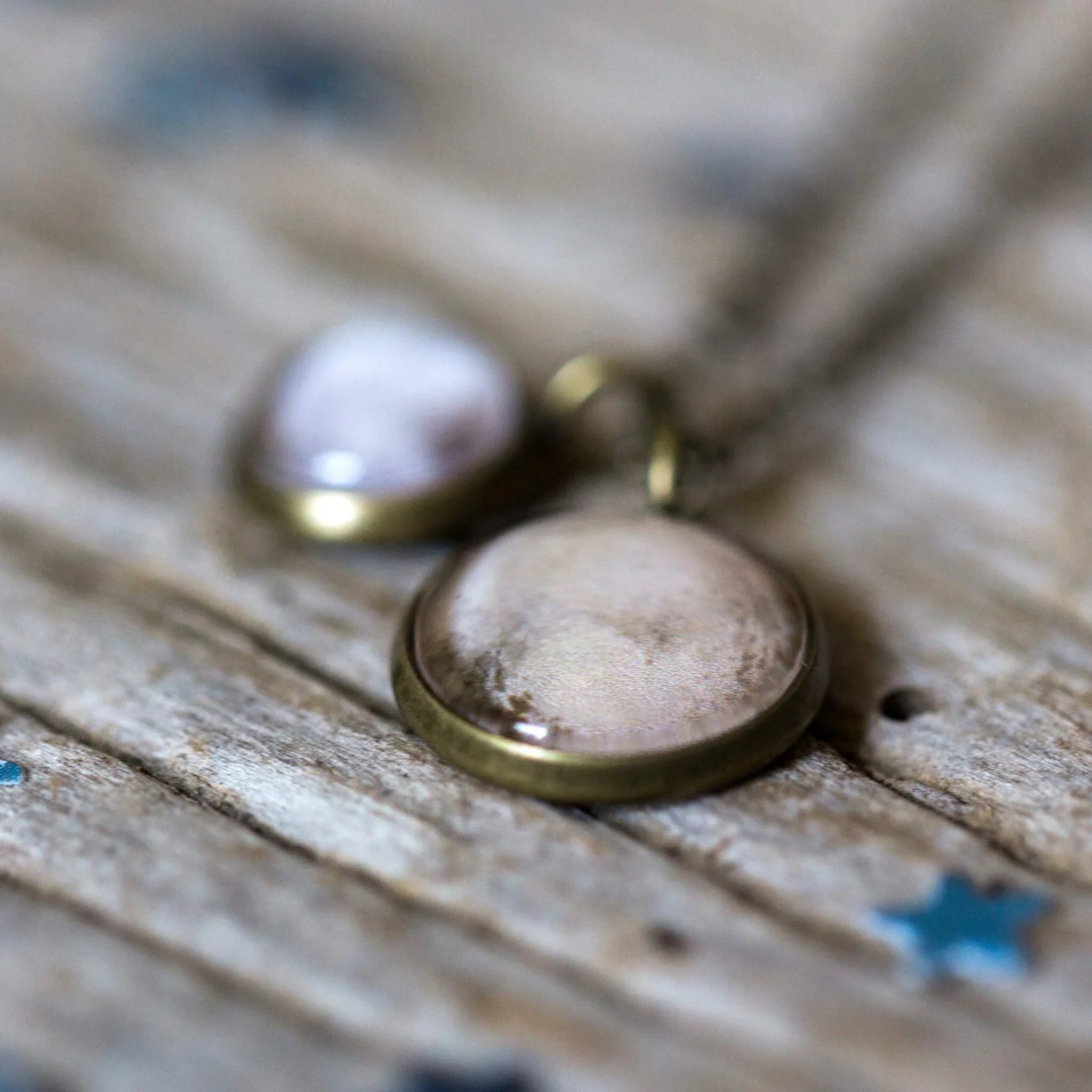 Handmade pendant necklace with glass dome on rustic wood, Qu!rk boutique jewelry
