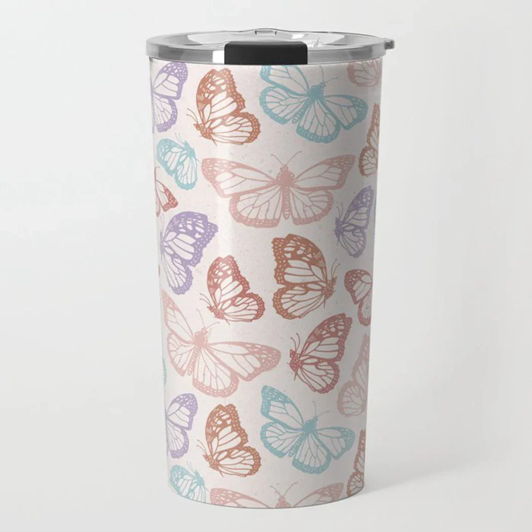 Tall insulated tumbler with pastel butterfly pattern in pink, blue, purple on white background