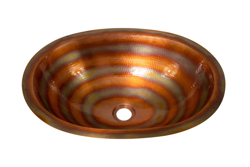 Hand-hammered copper sink with concentric bronze and gold tones, artisan home decor bowl