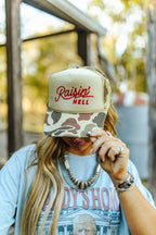 Raisin' Hell Green Camo Trucker Hat - Qu!rk Boutique