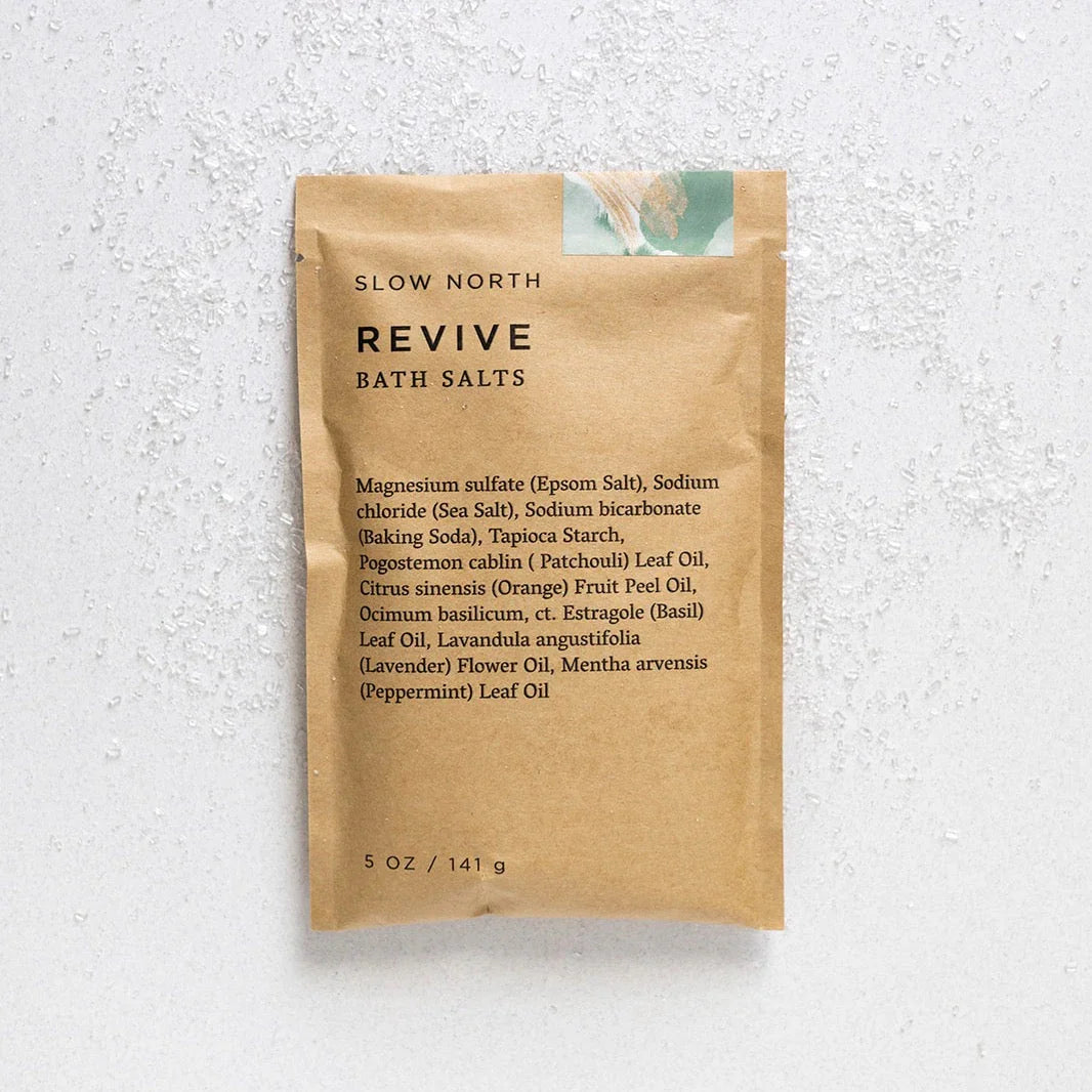Revive bath salts pouch by Slow North on light background, natural wellness gift from Qu!rk Boutique.