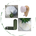 Reusable cotton rounds, facial brush, and sustainable skincare accessories from Qu!rk Boutique.