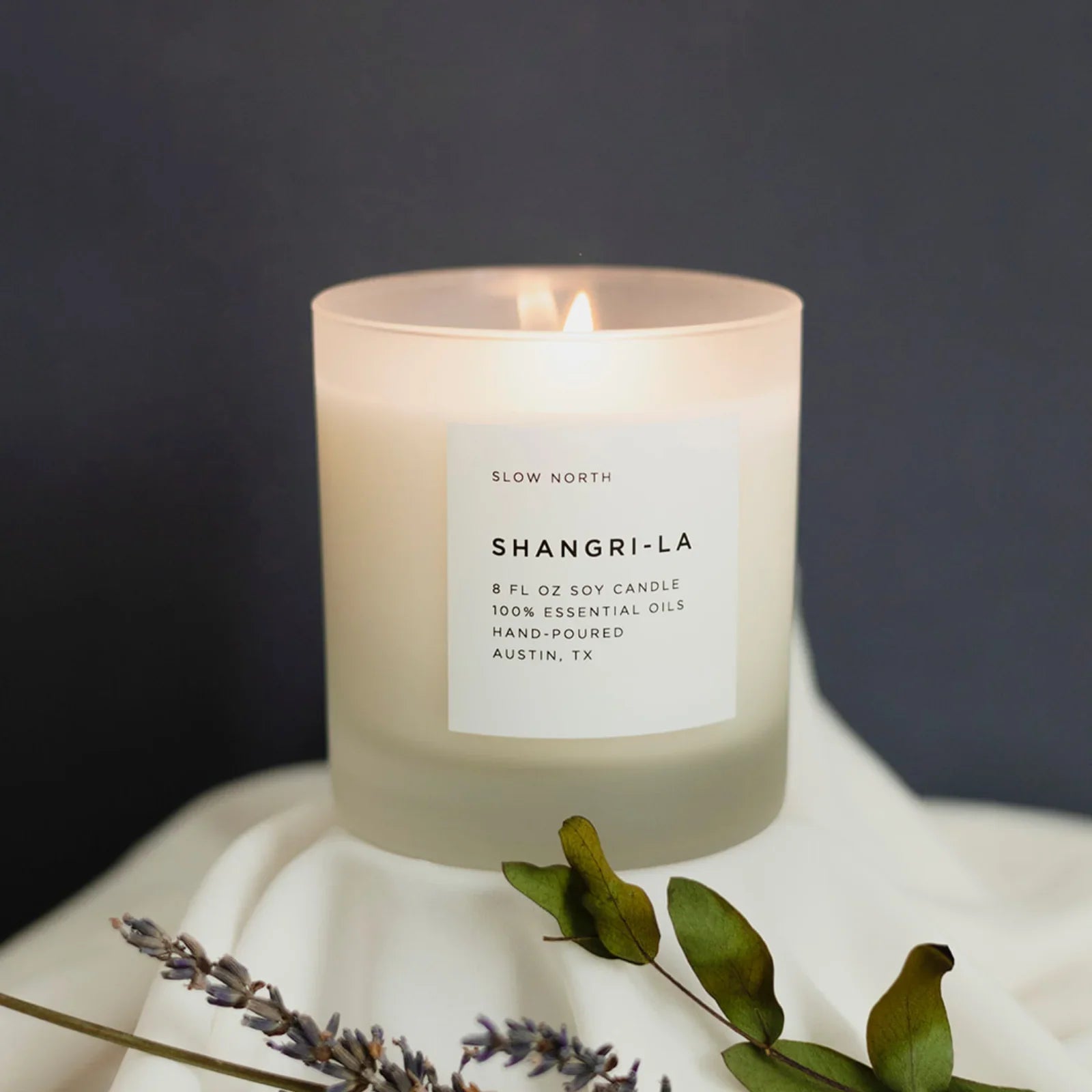 Shangri-La 8oz soy candle by Slow North, hand-poured in Austin TX, with lavender and greenery accents