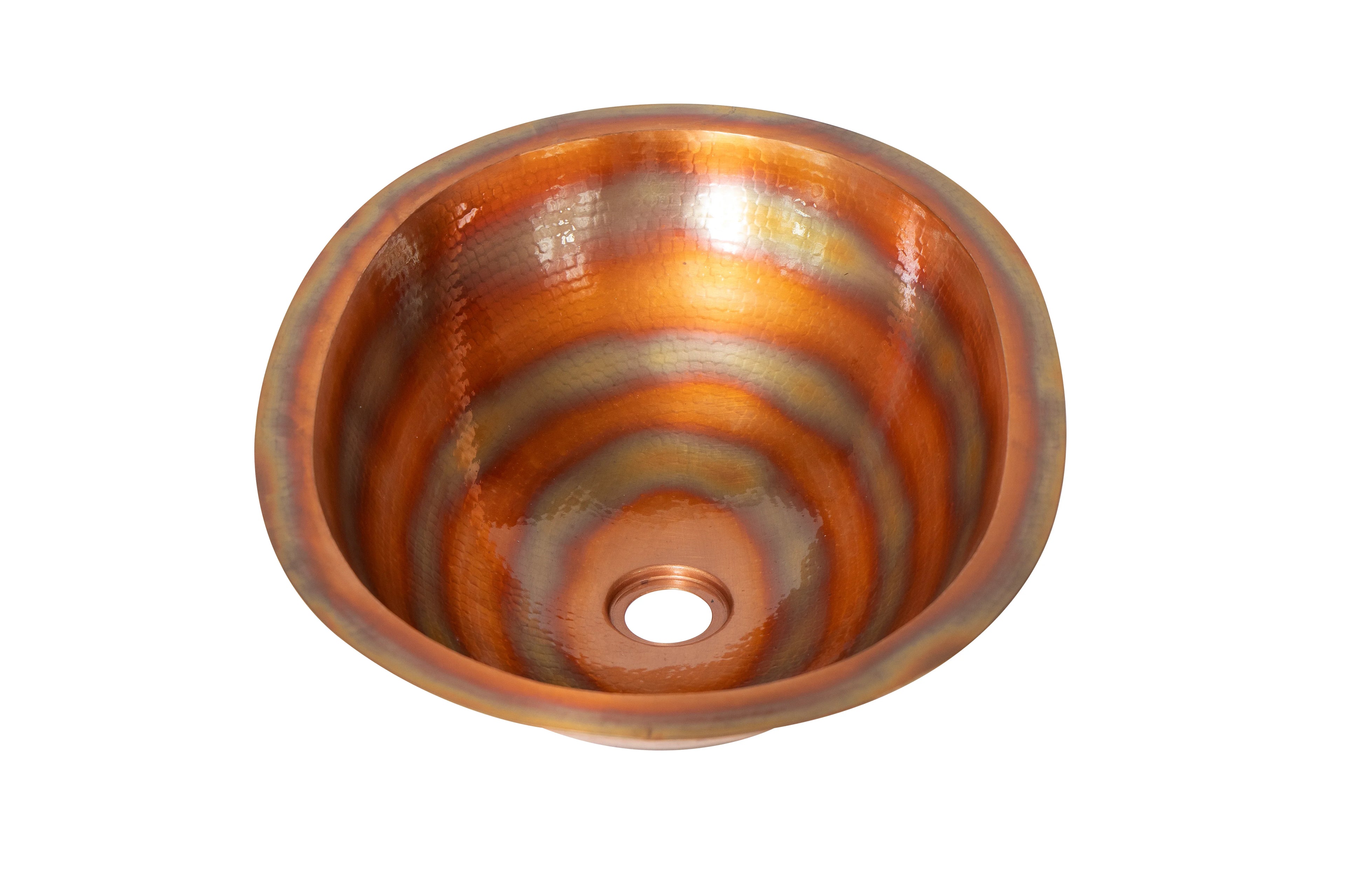 Hand-hammered copper sink with iridescent orange and gold concentric patterns