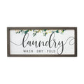 Framed laundry room sign with floral design, text reads wash dry fold in stylish script