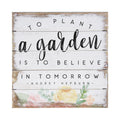 Rustic white wooden sign with floral art and Audrey Hepburn quote, garden-themed decor