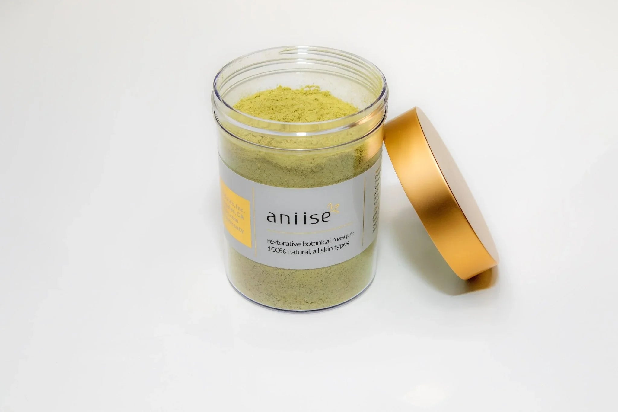 Aniise restorative botanical masque in clear jar with gold lid, natural skincare product