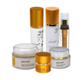 Anise skincare collection with gold and white jars and bottles, featured at Qu!rk Boutique