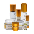 Anise skincare collection for mature skin with gold lids, featuring creams, serums, and oils.