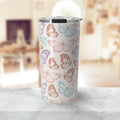 Stainless steel tumbler with pastel butterfly pattern on marble table in cozy room