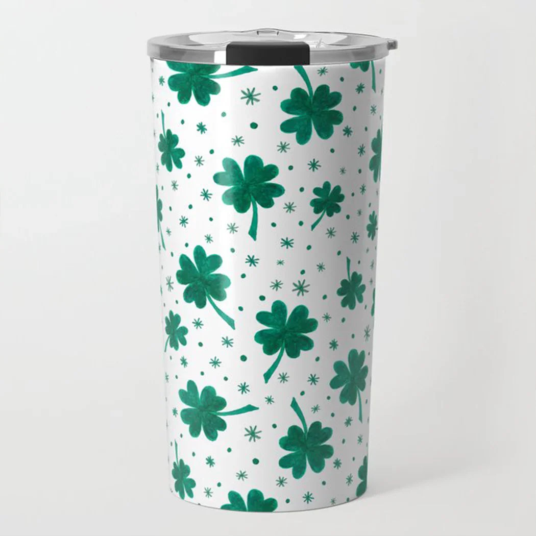 White stainless steel tumbler with green four-leaf clover pattern and silver lid
