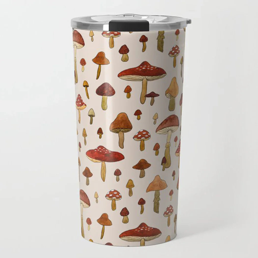 Tall tumbler with colorful hand-drawn mushrooms pattern on a light beige background