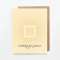 Beige greeting card with radiating lines, zigzag square, and text 'wishing you peace'