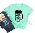 Mint green t-shirt with black beer mug graphic and text Wish You Were Beer, paired with ripped jeans