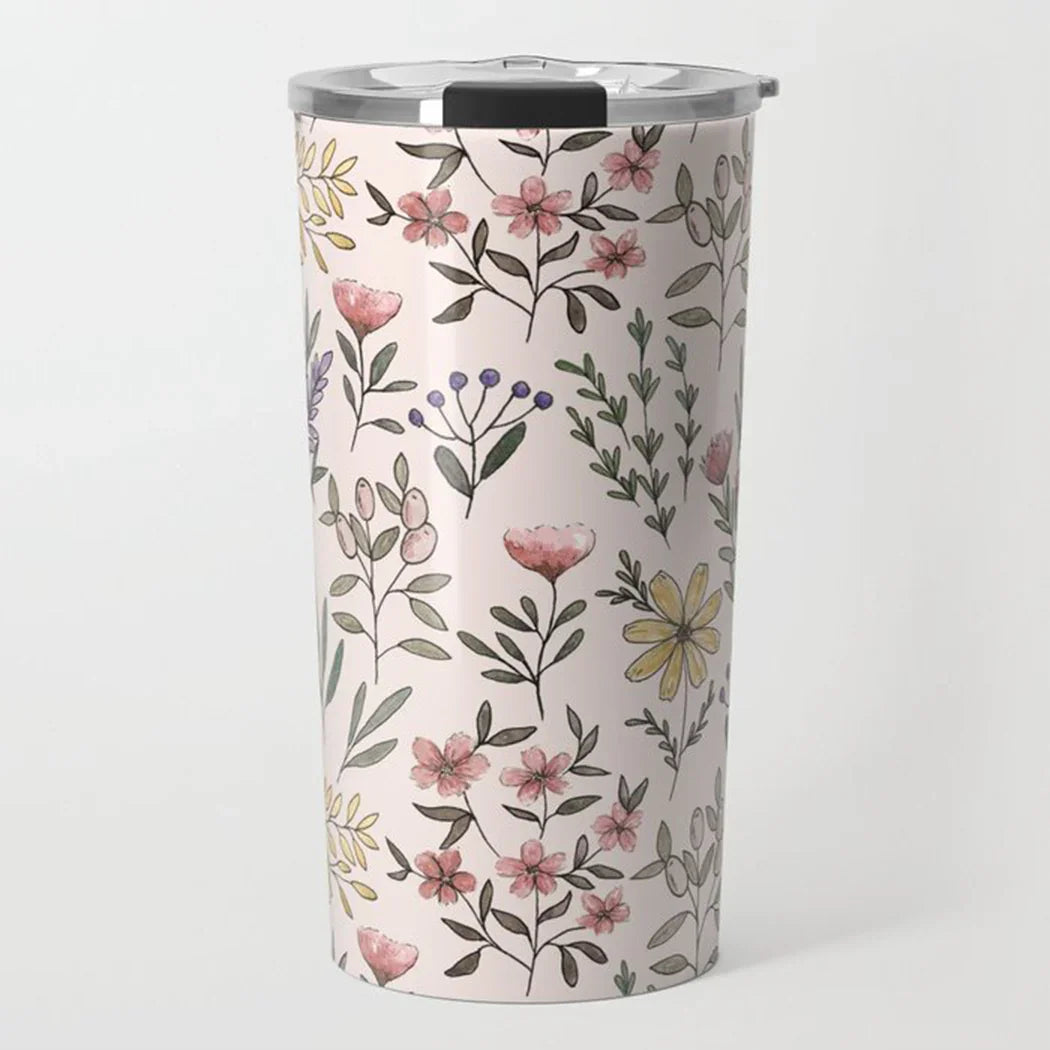 Pink floral stainless steel tumbler with colorful hand-drawn wildflowers and leaves design