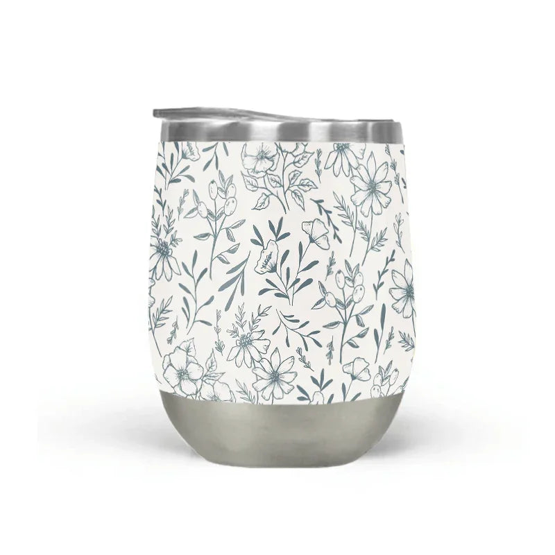Floral stainless steel tumbler cup from Qu!rk Boutique, featuring minimalist botanical design.
